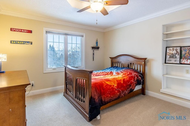 bedroom featuring crown molding, light carpet, and ceiling fan