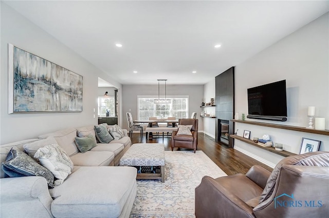 living room with wine cooler and wood-type flooring