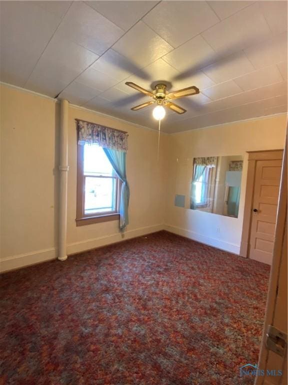 unfurnished room featuring ceiling fan