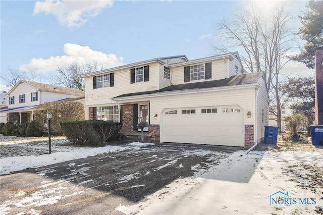 view of front property with a garage