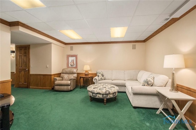 carpeted living room with crown molding