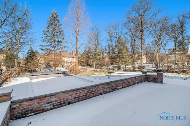 view of snowy yard