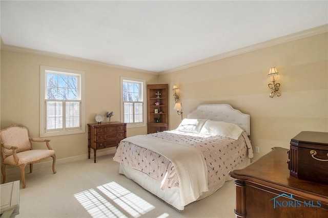 bedroom with crown molding and light colored carpet