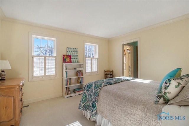 carpeted bedroom with crown molding