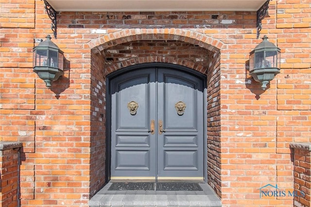 entrance to property featuring french doors