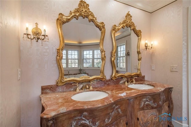 bathroom featuring vanity and ornamental molding