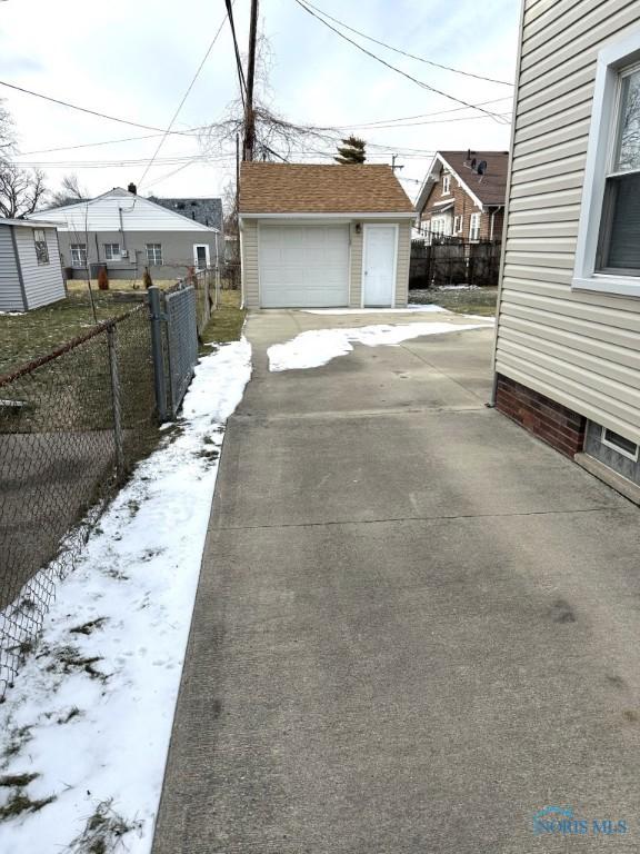 view of snow covered garage