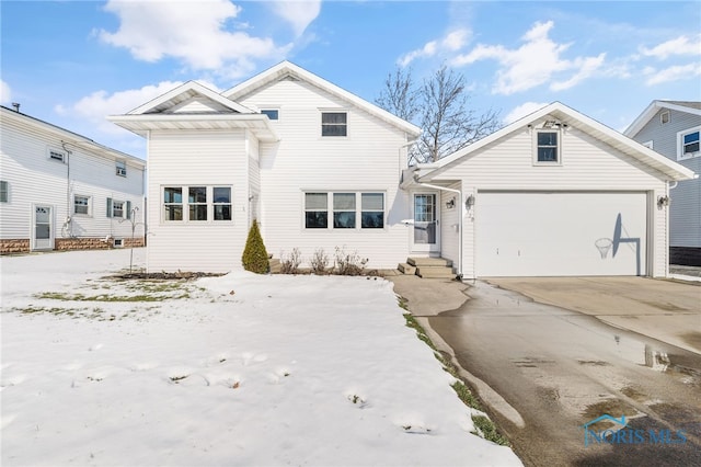 view of front of home with a garage