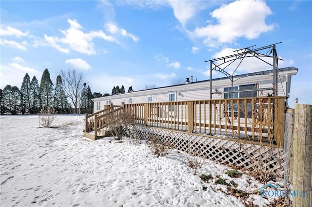 view of snow covered deck