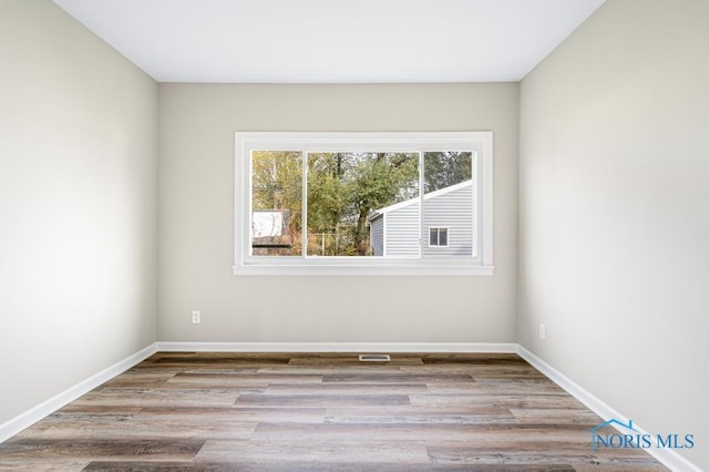 empty room featuring light hardwood / wood-style floors