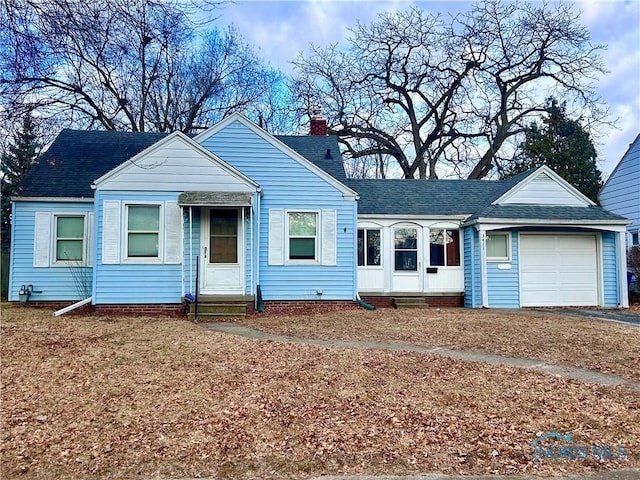 view of front of home with a garage