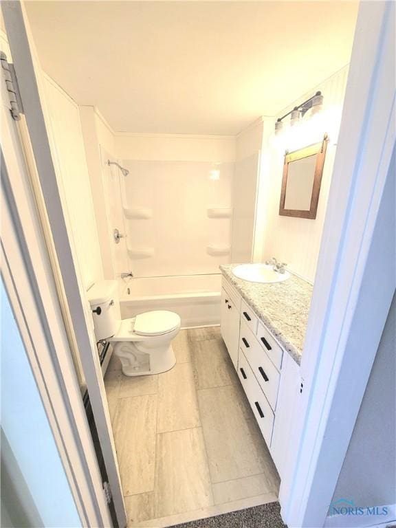 full bathroom with vanity, bathing tub / shower combination, and toilet