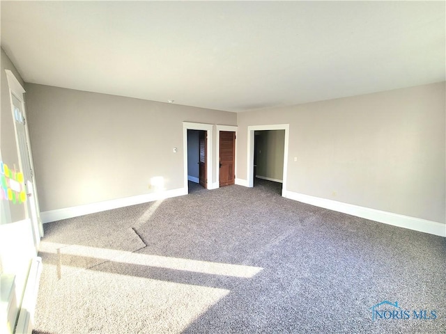 unfurnished bedroom featuring carpet floors