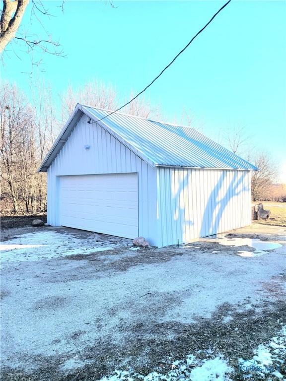 view of snow covered garage