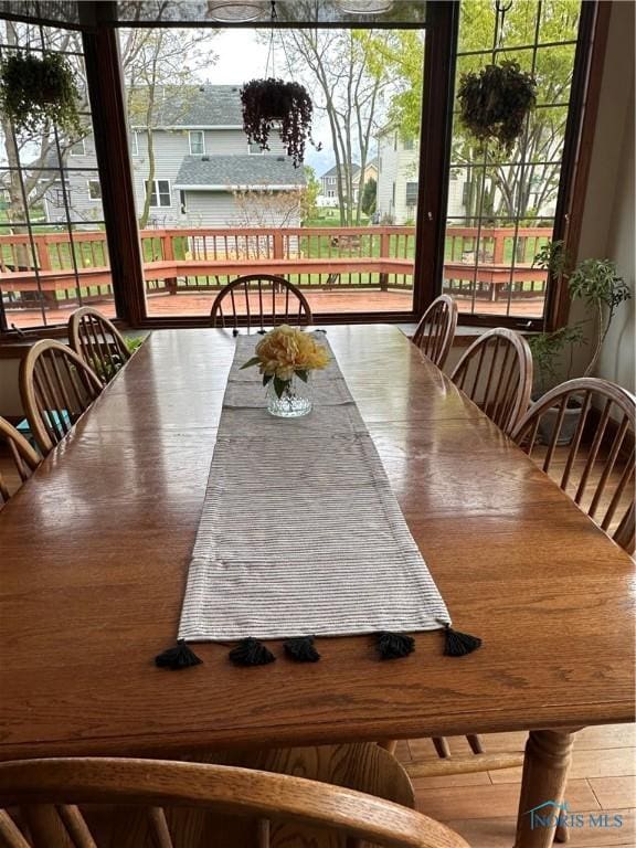 dining space featuring hardwood / wood-style floors