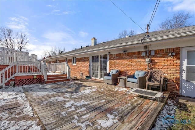 wooden deck with an outdoor hangout area