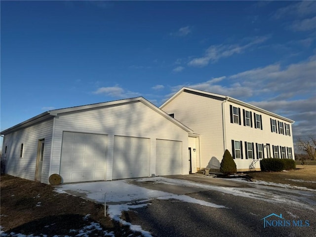 exterior space featuring a garage