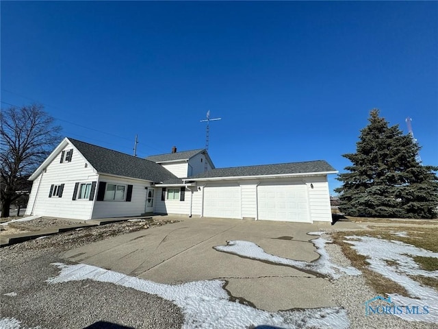 view of front of home featuring a garage