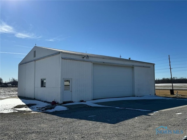 view of outdoor structure with a garage