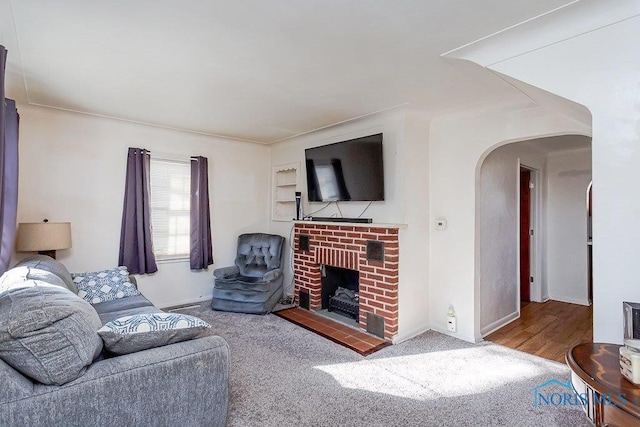 living room featuring a fireplace