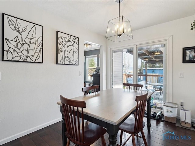 dining room featuring a notable chandelier