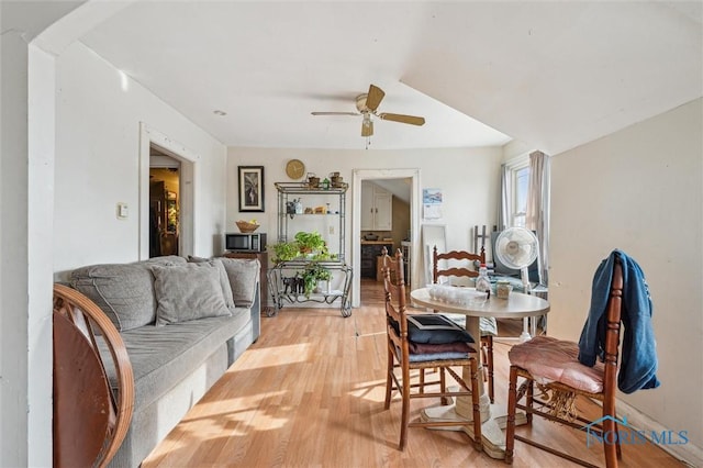 dining room featuring ceiling fan and light wood-type flooring