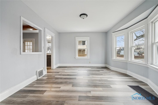 interior space with a healthy amount of sunlight and light hardwood / wood-style floors