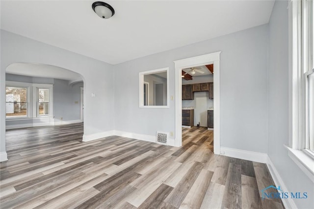 spare room with light wood-type flooring