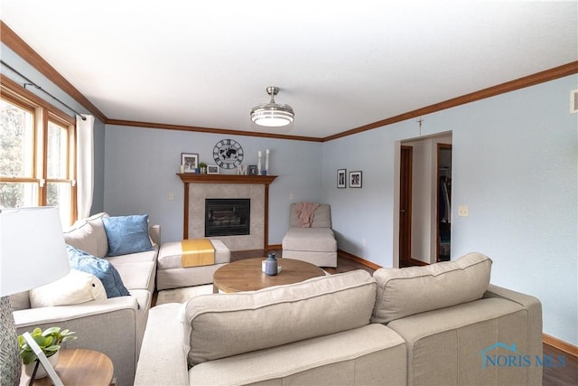 living room featuring a fireplace and ornamental molding