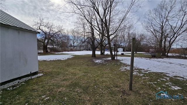 view of snowy yard