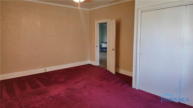 309 Appian Ave, Napoleon, OH 43545 - unfurnished bedroom featuring a closet, crown molding, dark colored carpet, and baseboards