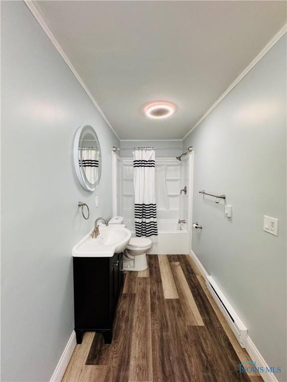 full bathroom with shower / bath combination with curtain, vanity, crown molding, and hardwood / wood-style flooring