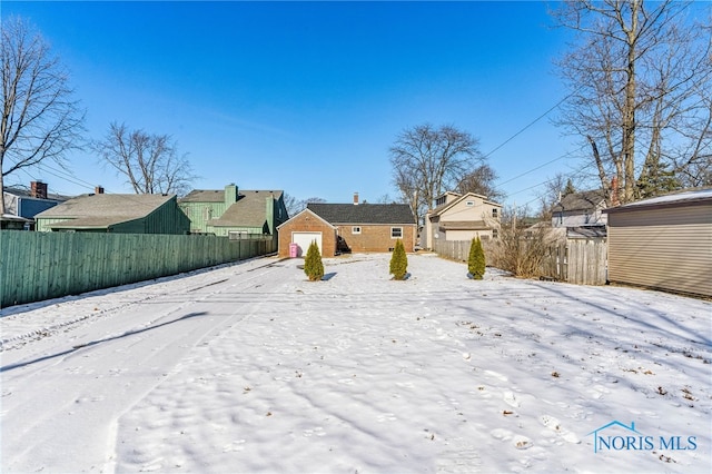 view of snowy yard