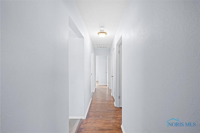 hall featuring dark hardwood / wood-style flooring