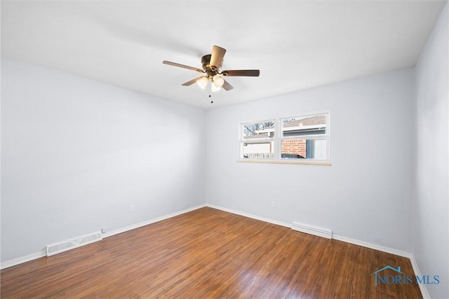 spare room featuring ceiling fan and wood-type flooring