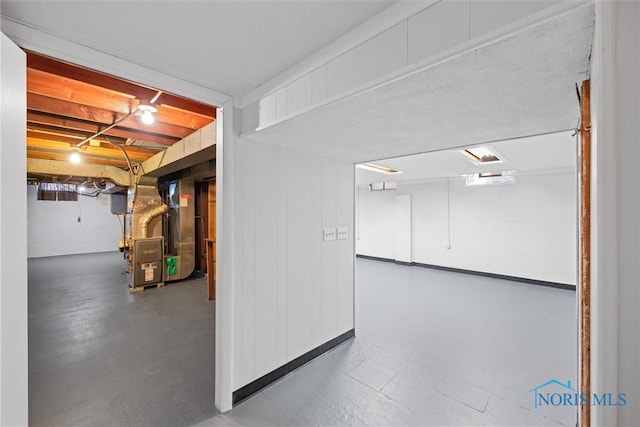 basement featuring heating unit