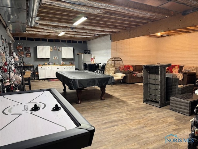 playroom featuring billiards, light hardwood / wood-style floors, and beamed ceiling