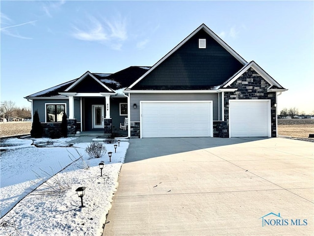 craftsman-style home with a garage