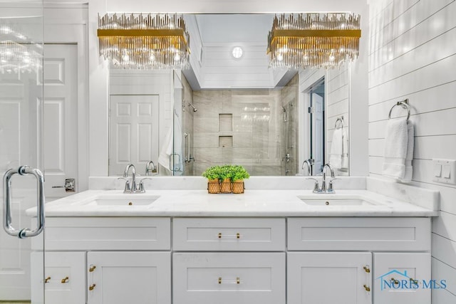 bathroom featuring vanity and a shower with shower door