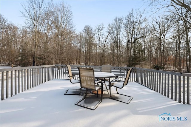 view of snow covered deck