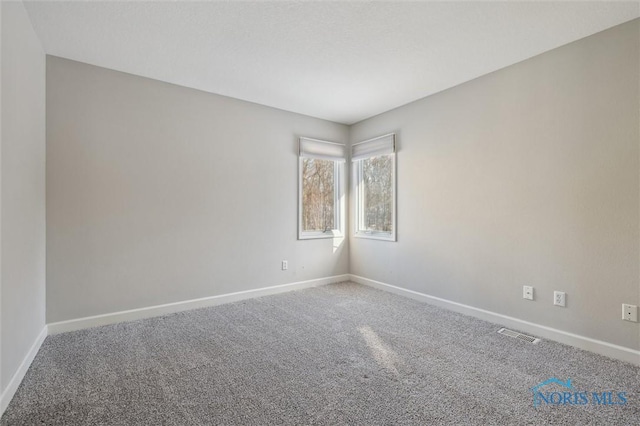 view of carpeted spare room