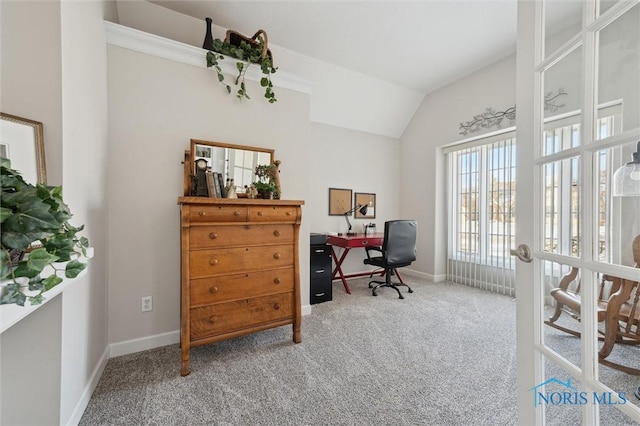 office featuring vaulted ceiling, french doors, and carpet flooring