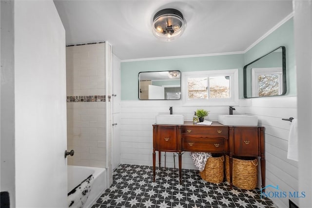 bathroom featuring crown molding and vanity