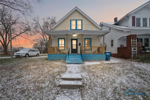 bungalow-style home featuring covered porch