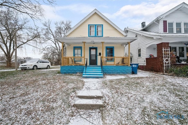 bungalow-style house with covered porch