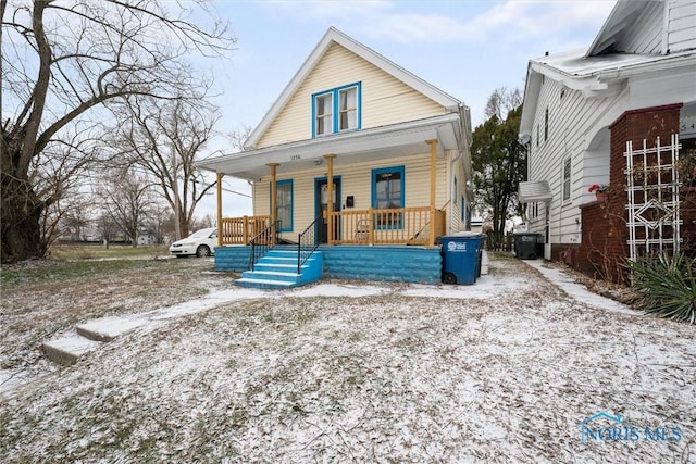 bungalow-style home featuring covered porch