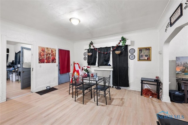 dining space featuring hardwood / wood-style flooring