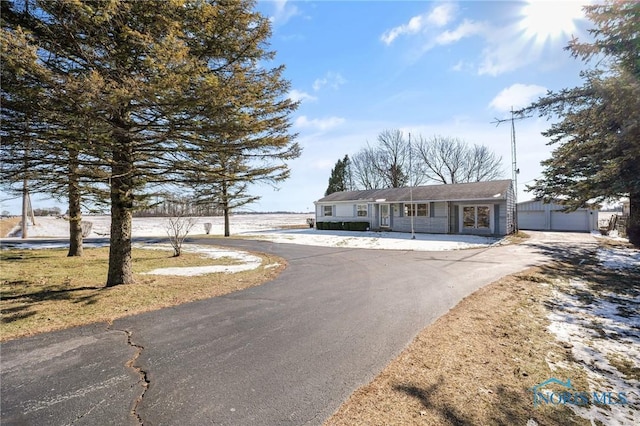 view of front of property featuring a garage