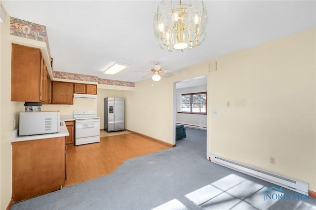 kitchen with white range with electric cooktop, hanging light fixtures, stainless steel refrigerator with ice dispenser, light carpet, and a baseboard radiator