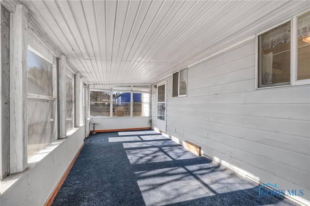 view of unfurnished sunroom